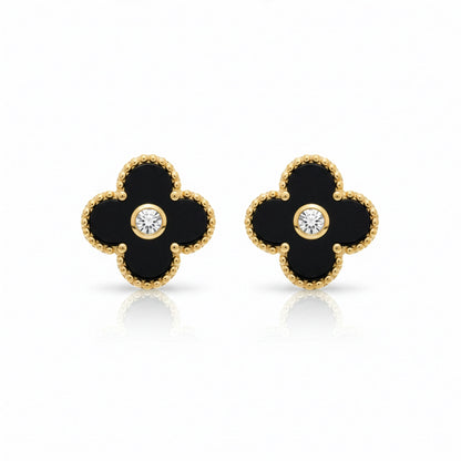 Boucles Trèfle Lumière Onyx — clous onyx noir cristal central doré flatlay — Beauty Store Maroc