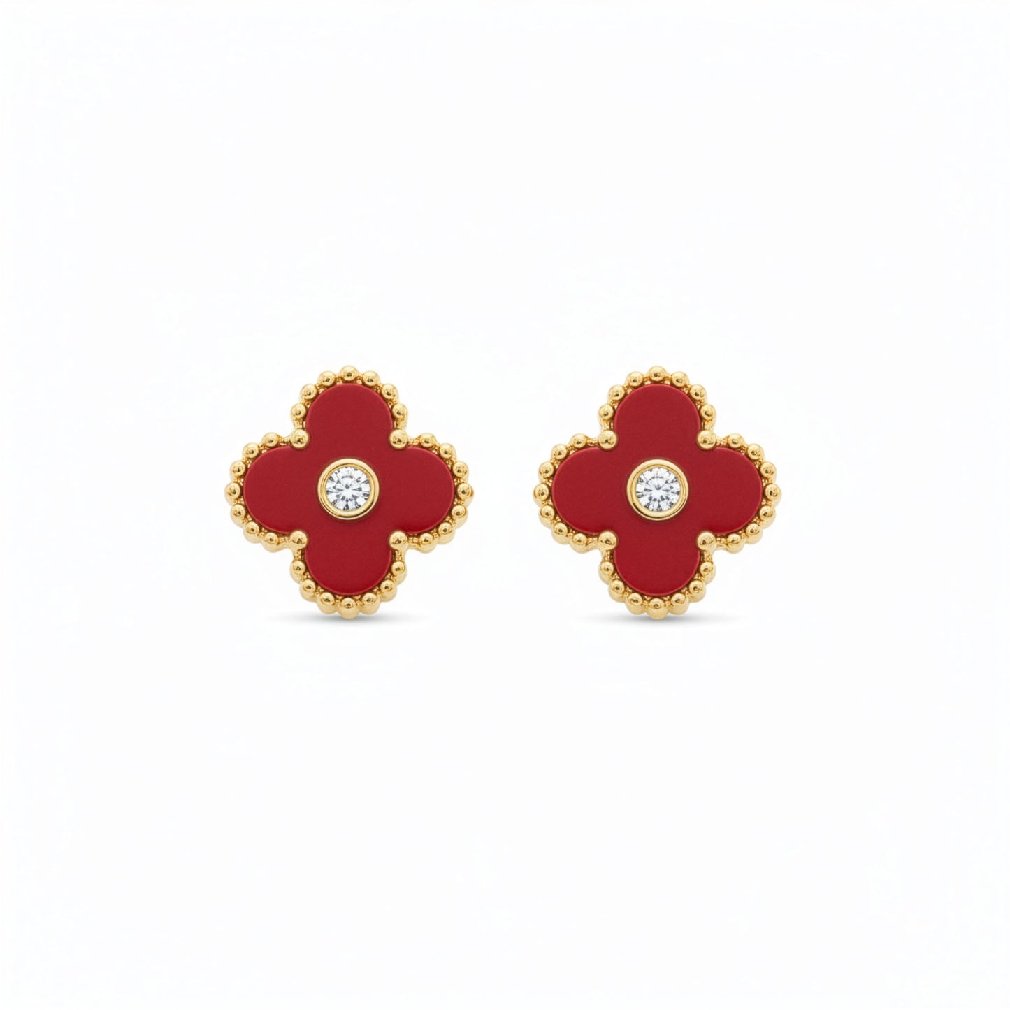 Boucles Trèfle Lumière Vermeil — clous rouge vermeil cristal central doré flatlay — Beauty Store Maroc
