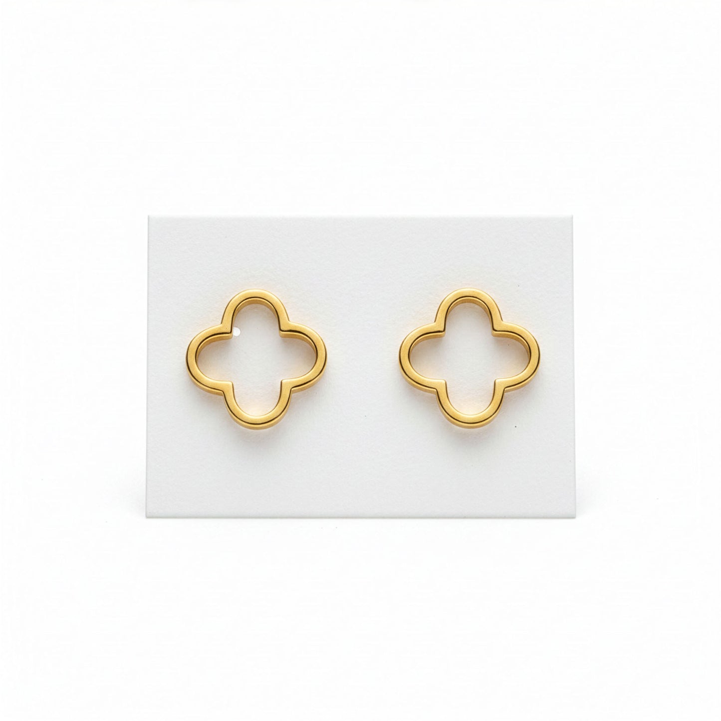 Boucles Trèfle Cascade dorées flatlay fond blanc — acier inoxydable | Beauty Store Maroc