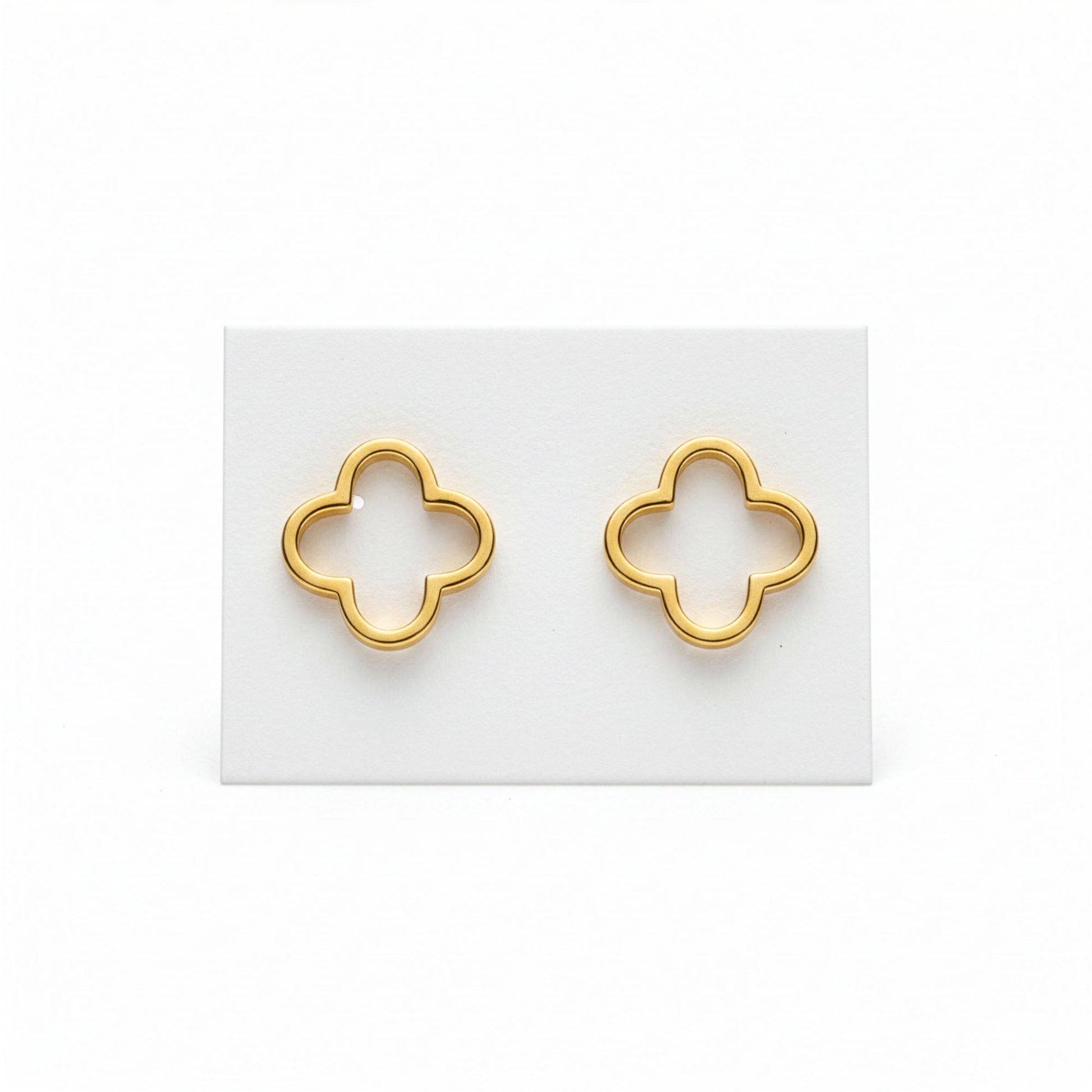 Boucles Trèfle Cascade dorées flatlay fond blanc — acier inoxydable | Beauty Store Maroc